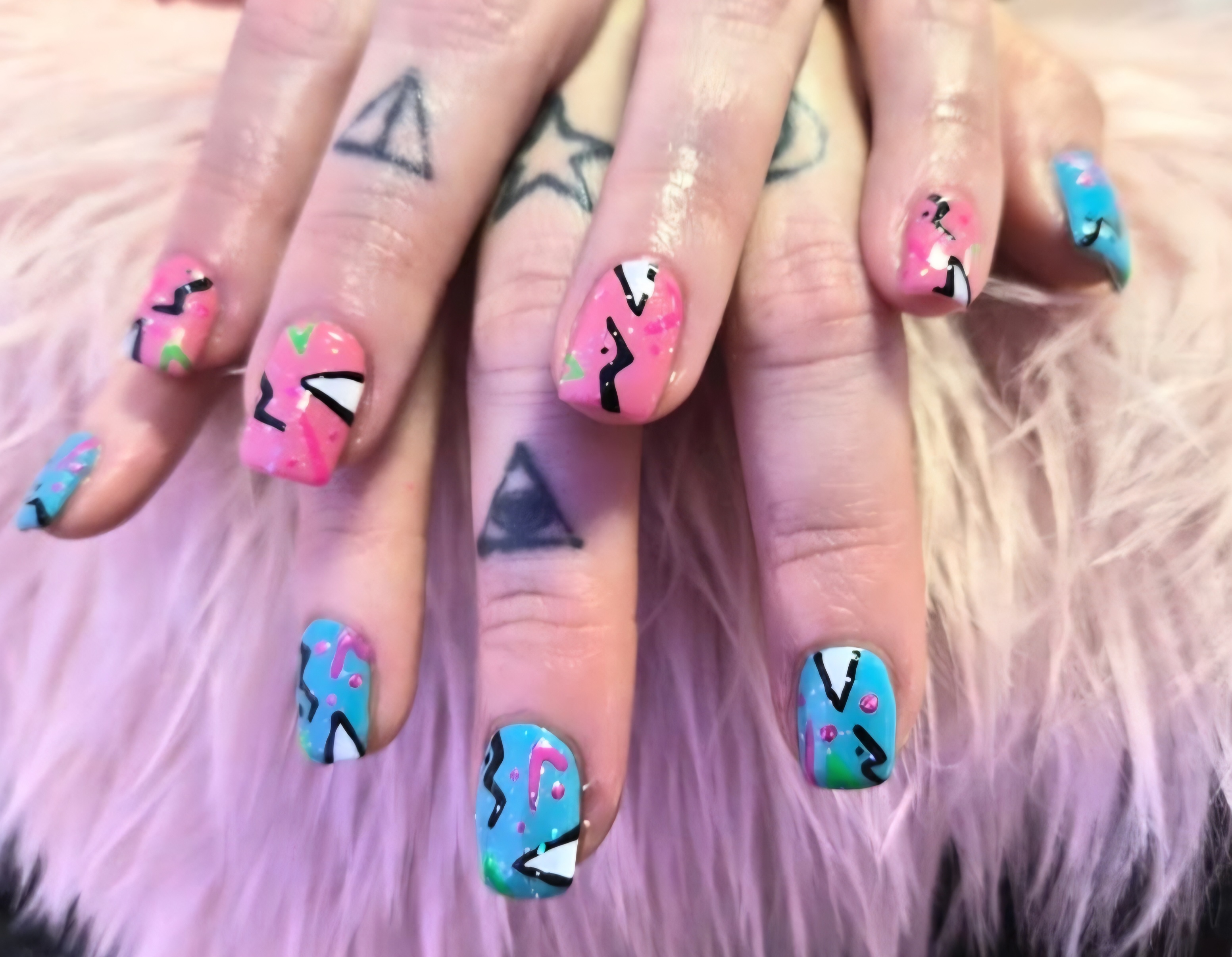 Orange and leopard print nails by Holly